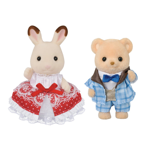 Two Calico Critters figures in formal attire - rabbit in red dress, bear in blue suit