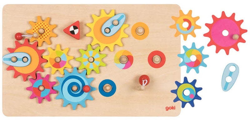 Goki wooden cogwheel game board with colorful interlocking gears and extra pieces