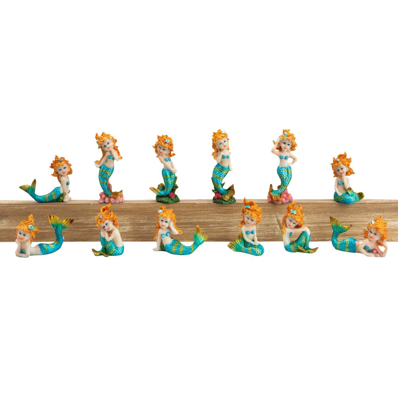 Collection of twelve small mermaid figurines with orange hair and teal tails in various poses