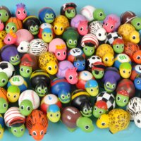 Assortment of 50 colorful 2-inch rubber ducks in various designs and colors