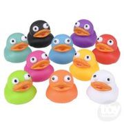 Collection of colorful 2-inch rubber ducks in various bright colors arranged on white background