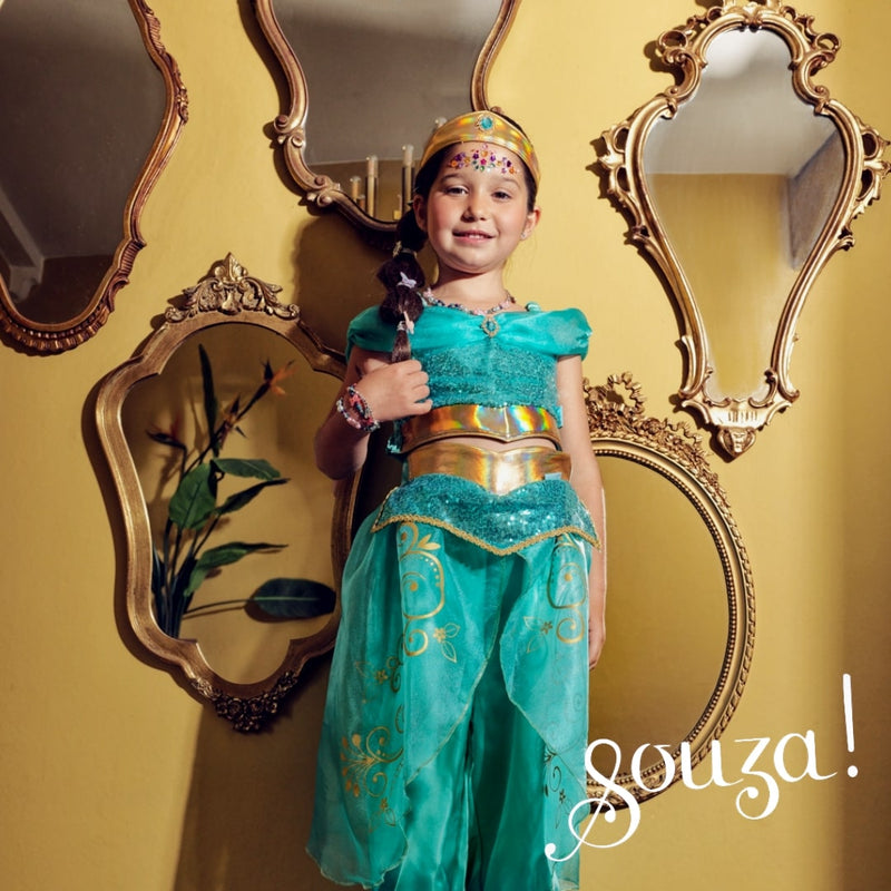 Child wearing turquoise Amira Genie costume set with headband and pants
