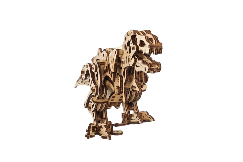 Wooden laser-cut 3D puzzle model of Tyrannosaurus Rex dinosaur on white background