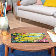 Colorful 500-piece jigsaw puzzle displayed on wooden coffee table in modern living room