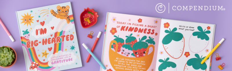 Compendium I'm Big Hearted activity book with kindness basket page displayed on purple background with art supplies