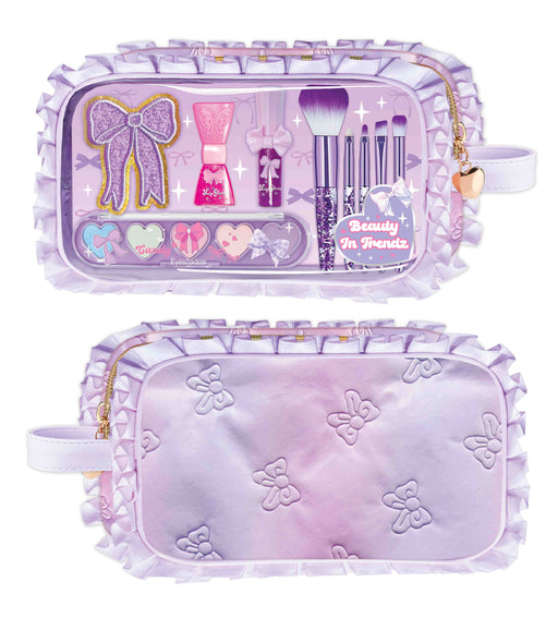 Purple makeup kit with bow design, eyeshadow palette, brushes and nail polish in decorative pouch
