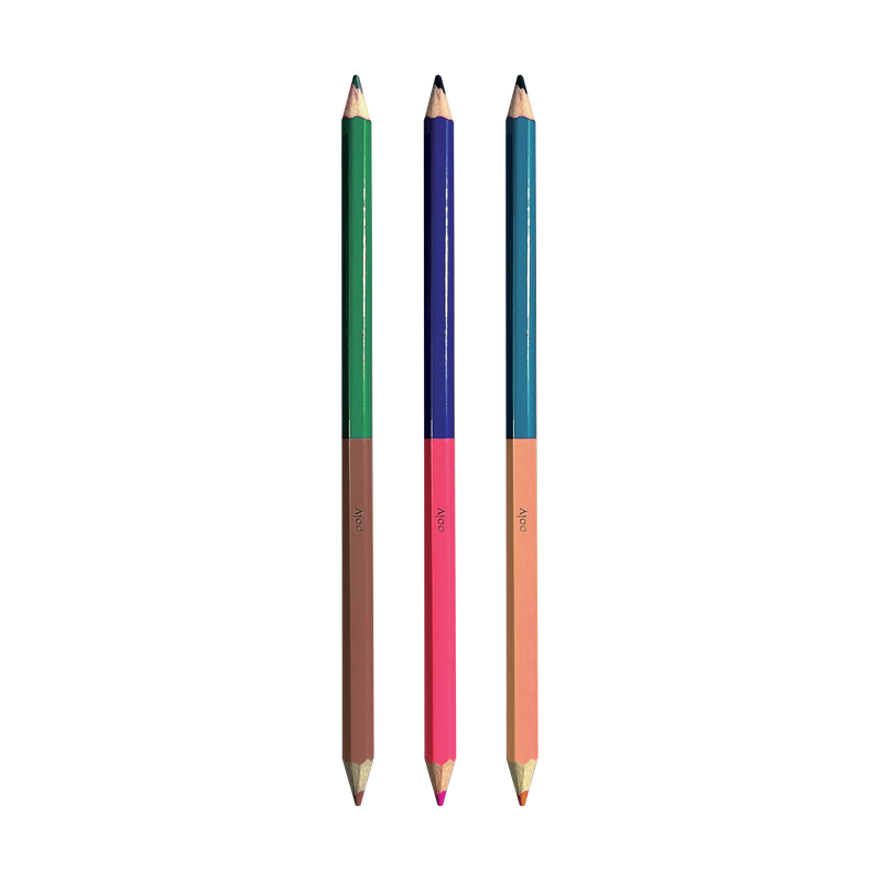 Three double-ended colored pencils with different color combinations on black background