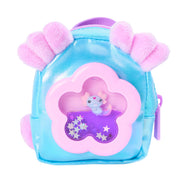 Real Littles Charms blue and pink backpack with flower window and unicorn figure inside
