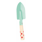 Mint green kids garden trowel with wooden handle featuring red polka dots