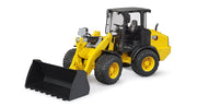 Yellow CAT wheel loader toy with black bucket on white background