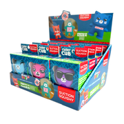 Display box of Cushy Cub suction cup squishy toys showing colorful animal characters
