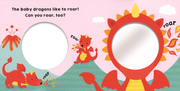 Baby Dragons interactive book page with circular mirrors and colorful dragon illustrations