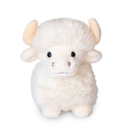 White fluffy Highland cow plush toy with horns and pink nose on white background