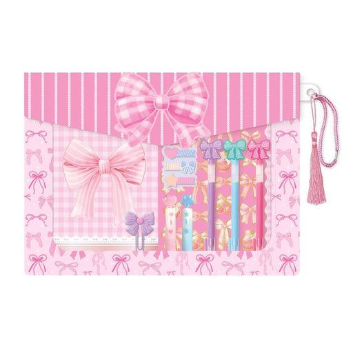 Pink bow-themed stationery set with folder, pens, and accessories in clear pouch