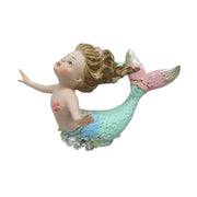 Mini mermaid figurine with blonde hair, turquoise tail and pink fins on white background