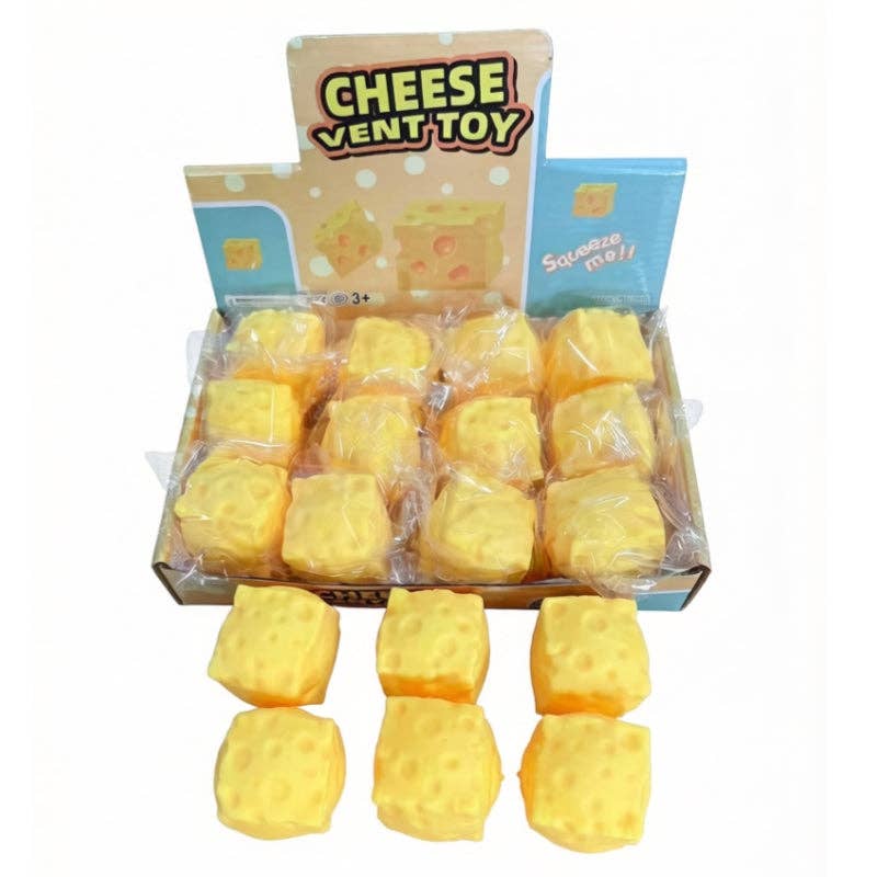 Yellow cheese-shaped squishy stress toys in display box with packaging