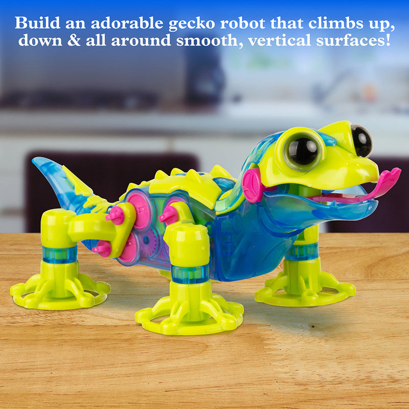 Colorful gecko robot toy with suction cups on wooden surface in kitchen setting