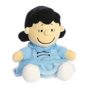 Lucy Peanuts character plush toy in blue outfit with black hair