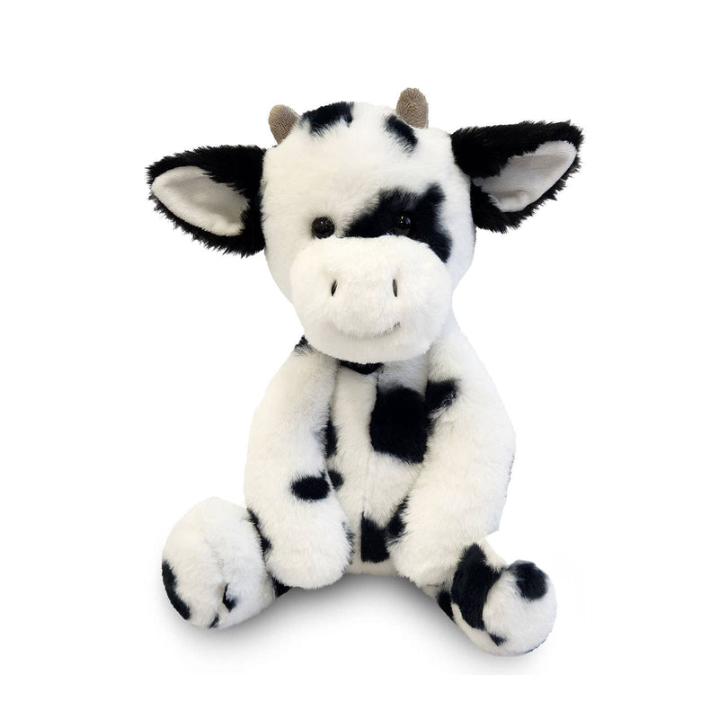 Black and white spotted cow plushie toy with horns and large ears sitting upright