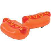 Two orange pull-back toy hot dogs with mustard decorations on white background