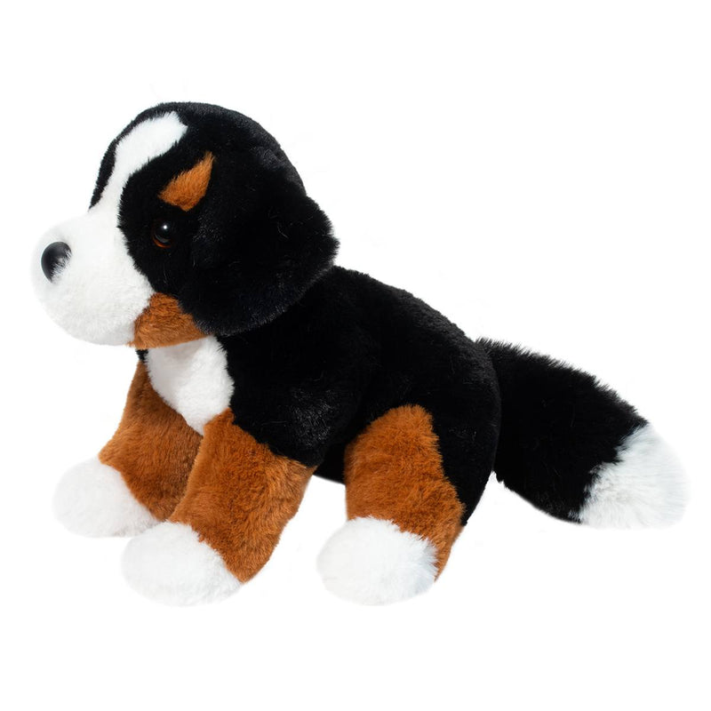Black, brown and white Bernese Mountain Dog plush toy on white background