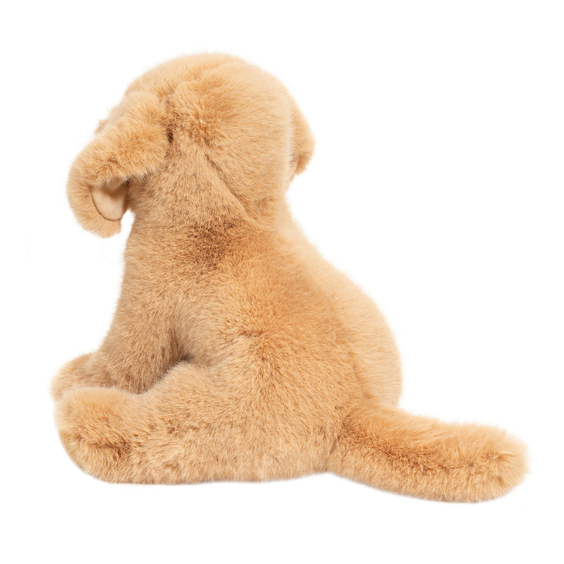 Golden retriever plush toy sitting in profile view on white background