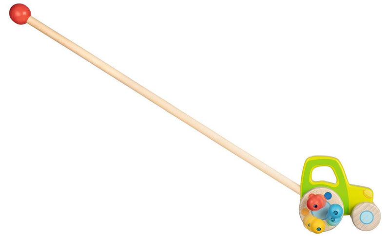 Goki wooden push along tractor toy with long handle and red ball grip