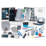 Complete spy detective kit with tools, evidence bags, fingerprint supplies and investigation materials laid out