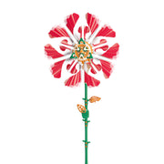 Solar-powered flower with red and white rippled petals on green stem