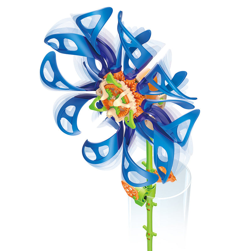Blue wind-powered spinning flower toy with colorful center on green stem