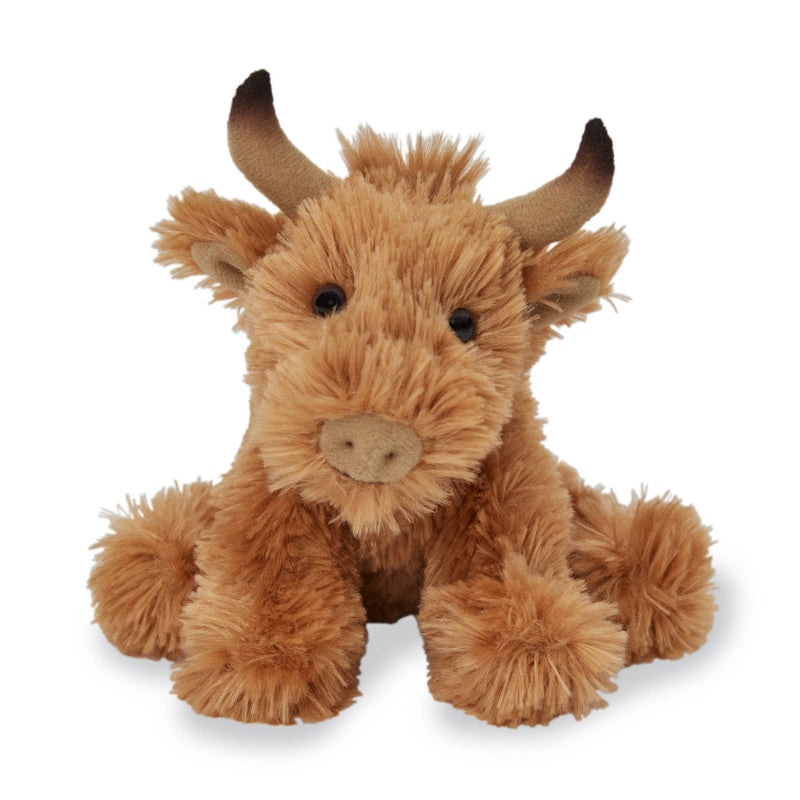 Miniature squishy highland cow stuffed animal with fluffy tan fur and horns
