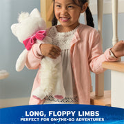 Child holding the Disney Toothpick Marie 15-inch plush