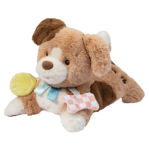 Plush puppy toy with tennis ball and colorful fabric attachments on white background