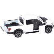 White diecast Ford F-150 Raptor pickup truck toy with open doors and tailgate