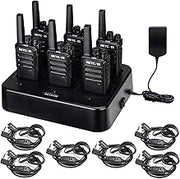 Set of six black walkie-talkies with charging station and cables