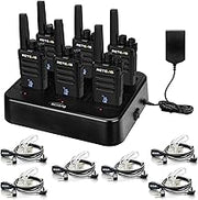 Six black walkie talkies with charging station and headsets