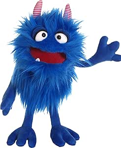 Blue furry monster puppet with horns, googly eyes, and red mouth waving hand