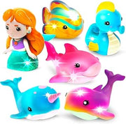 Colorful mermaid and sea creature light up bath toys including mermaid doll and marine animals.
