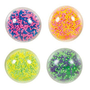 Four colorful Atomic Air Balls with gel-like texture and colorful beads inside