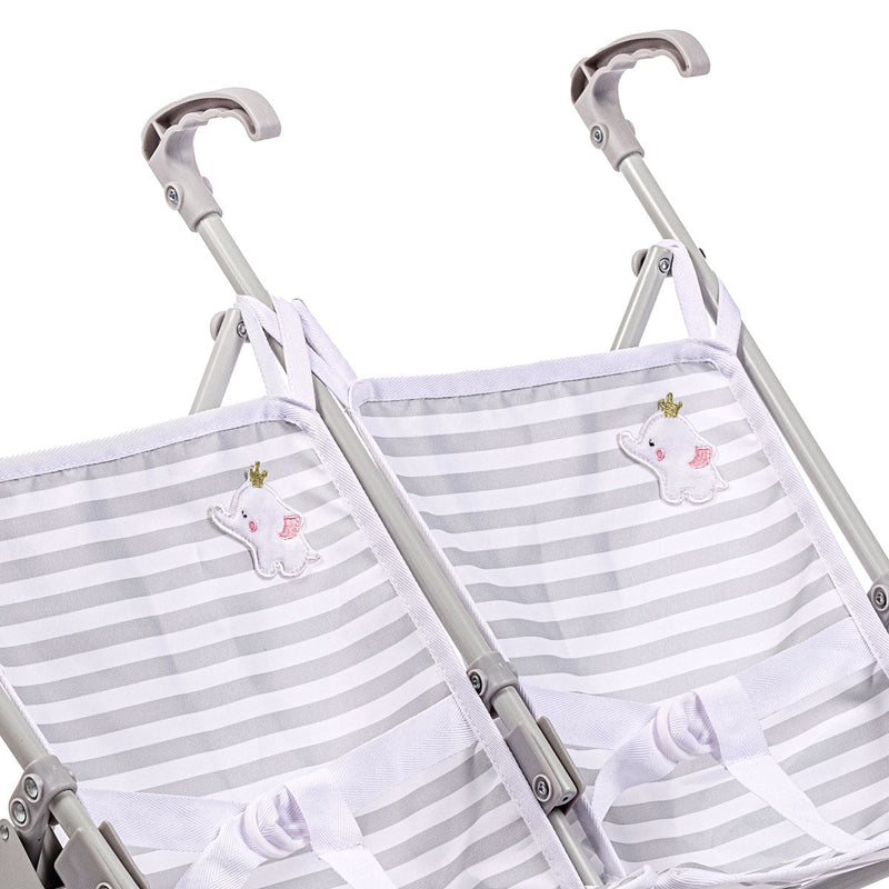 Close-up detail of twin umbrella stroller fabric seats with grey elephant design and striped pattern