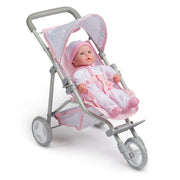 Pink baby doll stroller with baby doll in pink outfit on white background
