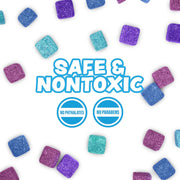 Colorful glittery mini bath bombs scattered on white background with safe nontoxic text