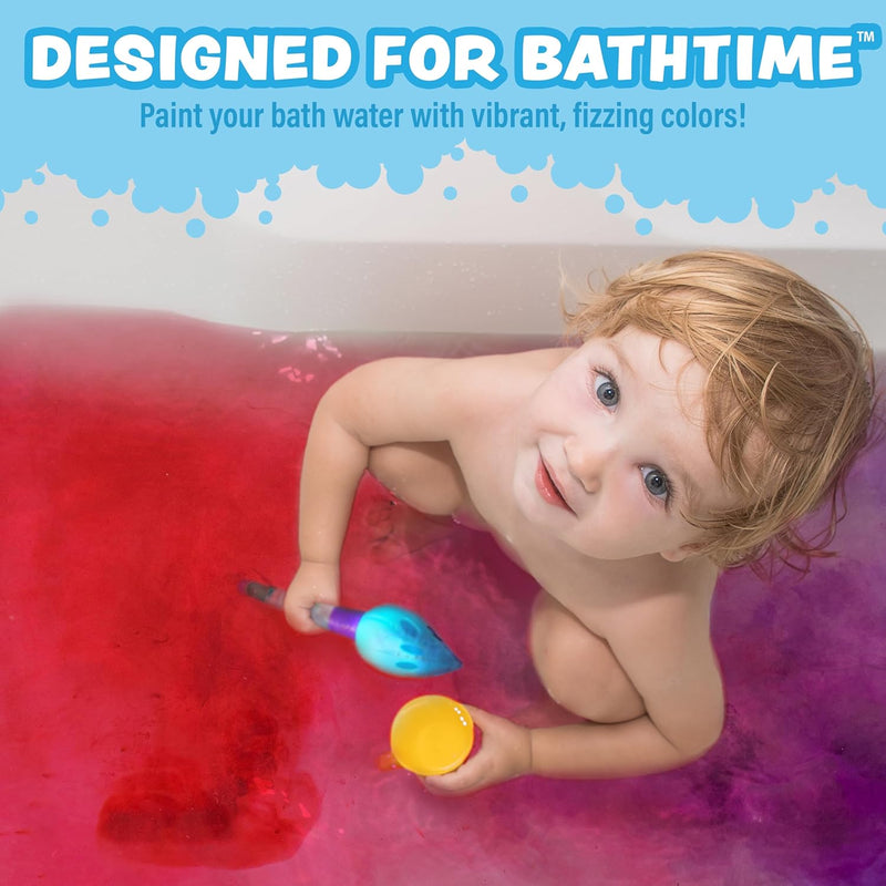 Child in colorful bath water using bath color brushes with red purple fizzing colors