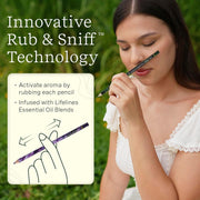 Woman demonstrating Rub & Sniff colored pencil technology with aromatherapy features