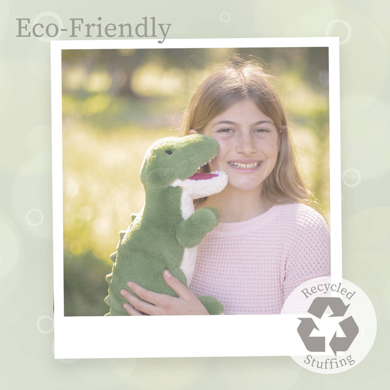 Young girl holding green T-Rex plush toy outdoors in natural lighting
