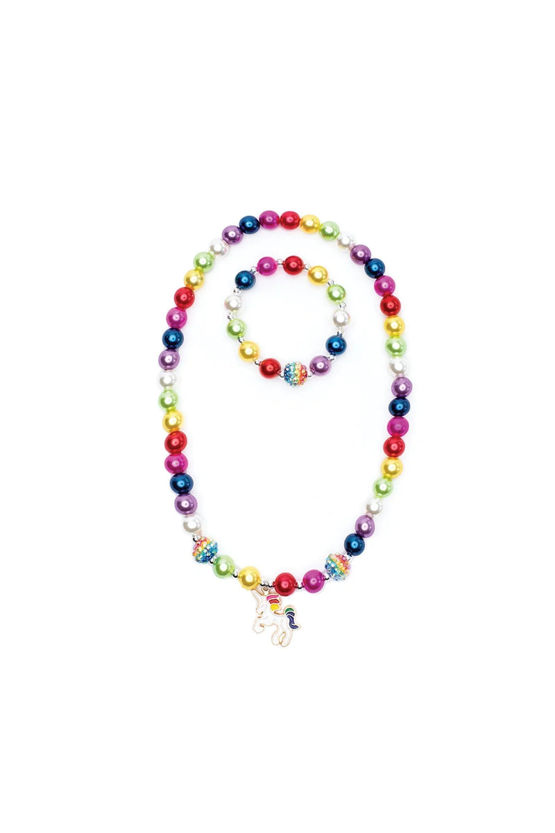 Colorful rainbow beaded necklace and bracelet set with unicorn charm on white background
