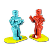 Two miniature Rock 'Em Sock 'Em robots, one blue and one red, on yellow platforms