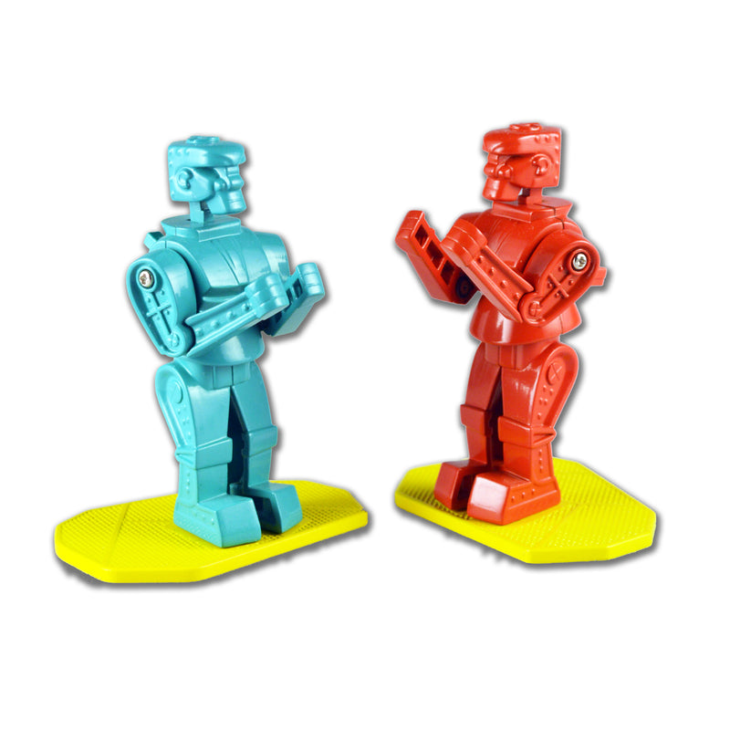 Two miniature Rock 'Em Sock 'Em robots, one blue and one red, on yellow platforms