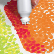 FlowArt Pogo-Dot creating colorful dotted paint pattern in orange red yellow green