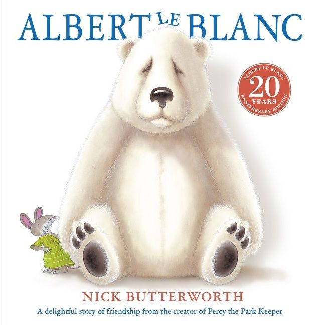 Albert le Blanc children's book cover featuring white polar bear and small character